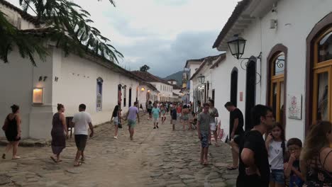 boys-singing-songs-and-many-people-walking-in-the-center-of-Paraty-Brazil