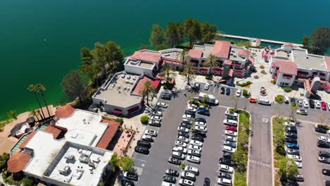 Aerial-drone-rotation-over-businesses-on-community-lake-mission-viejo