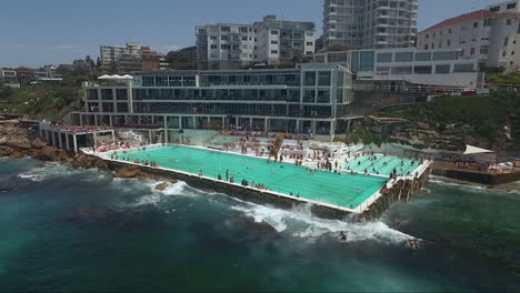 Waves-breaking-on-the-Bondi-Icebergs-Club-Pool-on-a-hot-Summer-day-in-Sydney