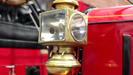 Close-up-shot-of-a-vintage-lantern-on-an-oldtimer-bus-coach