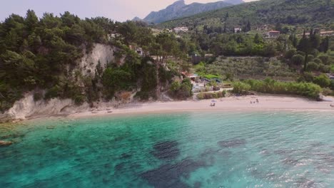 Aerial:-A-quiet-beach-on-Samos-island,-Greece