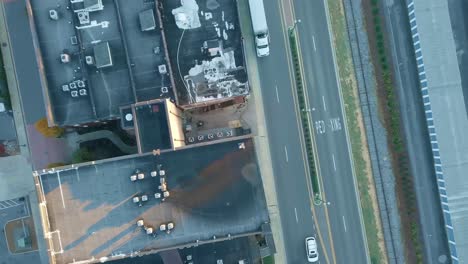 Aerial-Moving-Shot-Over-Building-Tops-in-Downtown-City