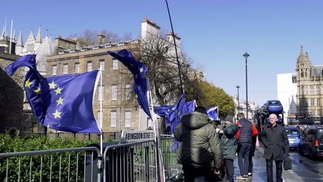 Row-of-European-Flags-attached-to-railings-outside-UK-Parliament-relating-to-Brexit