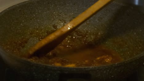 Closeup-shot-of-adding-water-into-Chilli-Prawns-Oriental-Dish