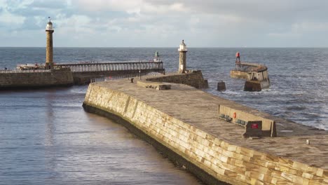The-east-and-west-piers-at-Whitby,-North-Yorkshire,-England