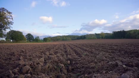 Tilt-upwards-of-ploughed-field-in-Autumn