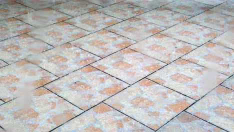 Hailstone-fall-on-terrace-tiles-while-storm