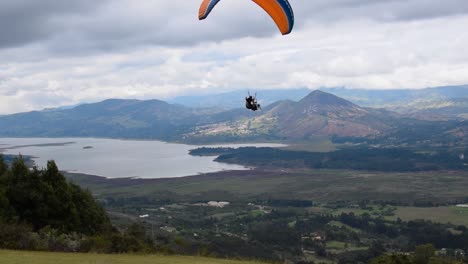 Man-doing-paragliding-on-a-mountain-with-a-beautiful-view