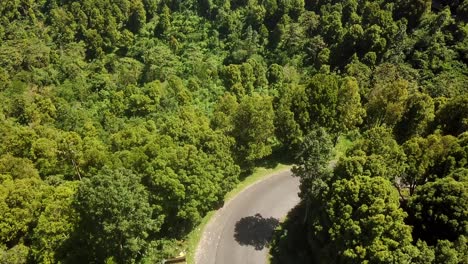 drone-footage-of-flying-straight-to-the-road-on-the-hill-of-a-cliff-in-Bali-4K-and-30-fps
