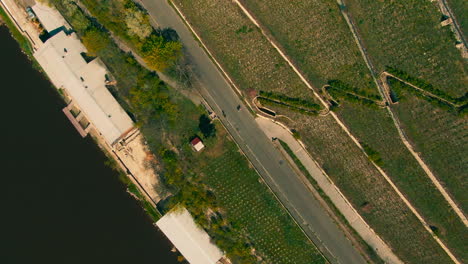 top-down-aerial-country-road-riverside-winery