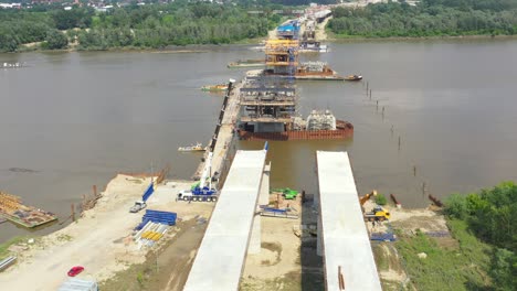 Aerial-view-of-the-construction-of-the-bridge-and-the-highway-passing