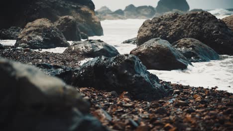 Ocean-tide-hitting-rocks-on-beach