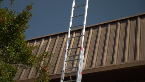A-fire-rescue-ladder-is-set-against-a-building