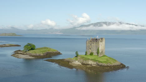 An-aerial-view-of-Castle-Stalker-on-Loch-Laich-on-a-sunny-morning