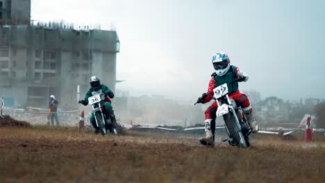 Multiple-dirt-bike-racing-on-the-track