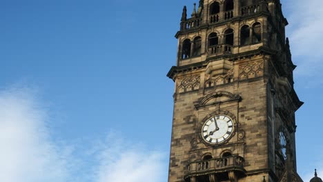 Town-Hall-Sheffield-Lower-Angle-framed-right-close-up-of-the-clock-Sheffield-City-Centre-near-Peace-Gardens-Main-Building-Summer-Sunny-Day-4K-25p