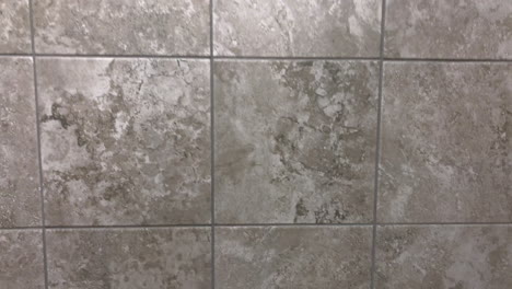 Dark-gray-wall-tiles-or-floor-tiles-in-slow-motion