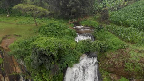 Aerial-shot-moving-forward-over-the-top-of-sipi-falls-towards-sipi-river-on-top-of-the-plateau