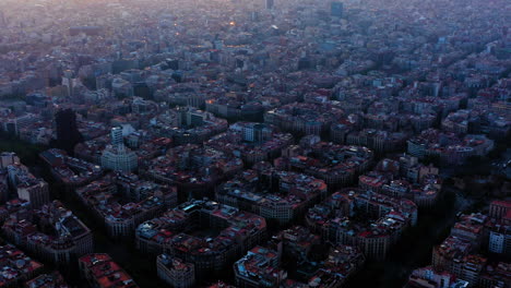 Barcelona-cityscape-High-angle-view,-at-sunset-with-clouds,-Spain