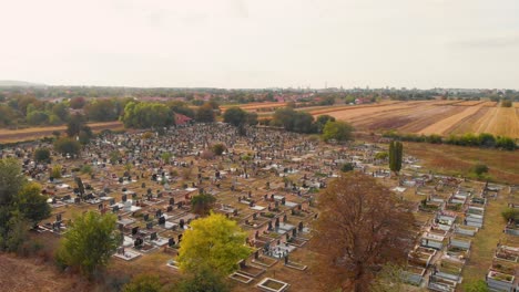 Aerial-drone-footage-of-the-cemetery-by-the-village