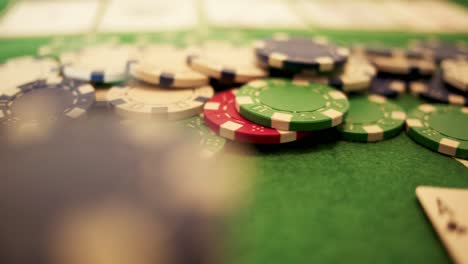 Two-Aces-Lie-on-a-Casino-Table---Camera-Pan---Close-Up---Slow-Motion