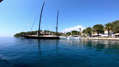 Leaving-Cavtat-by-sea-with-an-amazing-panorama-and-view-over-a-toll-black-yacht