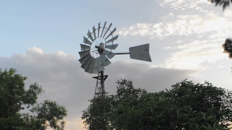 Strong-Winds-Spin-Windmill-at-Sunset