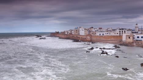 Wide-angle-view-from-elevated-position-of-the-walled-castle-city-of-Essaouira,-Morocco-on-a-stormy-day