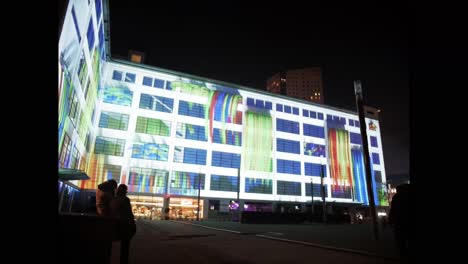 Timelapse-of-light-show-on-exterior-wall-of-building-at-Glow-festival-in-Eindhoven