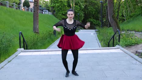 Incredible-white-female-dancer-does-a-dance-routine-outside