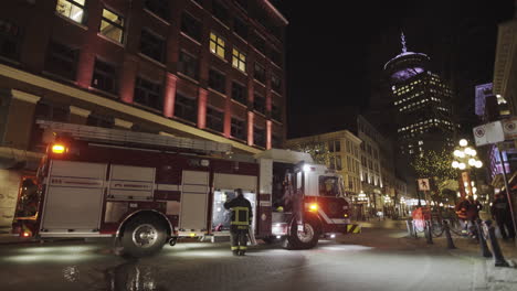 Fire-engine-truck-emergency-at-Night-Gastown-street-in-Vancouver-Canada-BC