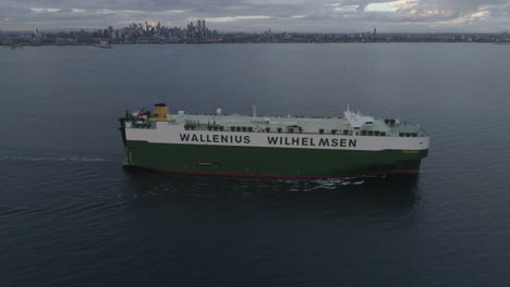 Wallenius-Wilhelmen-cargo-ship-travels-in-bay-out-of-city