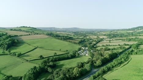 Cinematic-aerial-approach-towards-a-small-picturesque-village-in-rural-Britain