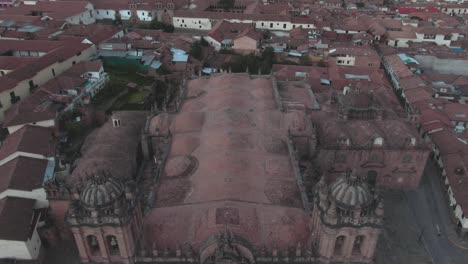 4k-daytime-aerial-drone-footage-revealing-the-main-Cathedral-from-Plaza-de-Armas-in-Cusco,-Peru-during-Coronavirus-lockdown