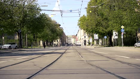 Due-to-the-coronavirus-pandemic-,-the-normally-busy-MaximilianstraÃŸe,-a-well-known-shopping-street-in-the-centre-of-Munich-is-empty