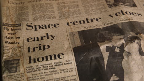 Apollo-twelve-nineteen-sixty-nine-newspaper-report-astronauts-Charles-Pete-Conrad,-Alan-bean-and-Richard-Gordon-head-back-for-the-earth-today