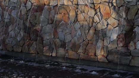 Understated-urban-rock-wall-fountain-has-calming-geometric-symmetry