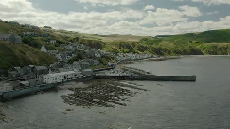 Aerial-view-of-the-Gardenstown-on-the-Aberdeenshire-coastline-on-a-summer-day