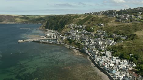 Aerial-view-of-the-Gardenstown-on-the-Aberdeenshire-coastline-on-a-summer-day