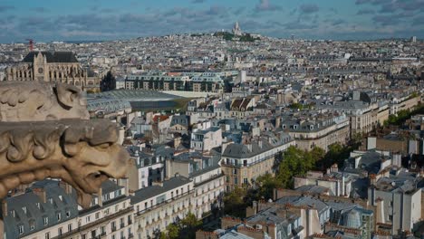 Aerial-view-of-Sacre-Couer-Cathedral-high-above-the-rooftops-of-Paris,-France