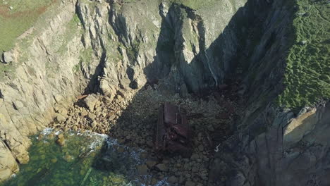 Flyover-Ruins-Of-RMS-Mulheim-A-Shipwreck-In-Cornwall-United-Kingdom---aerial-shot