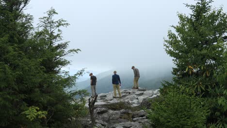 Three-male-hikers-at-the-Rohrbaugh-Cliffs-in-the-Dolly-Sods-Wilderness,-part-of-the-Monongahela-National-Forest-in-West-Virginia