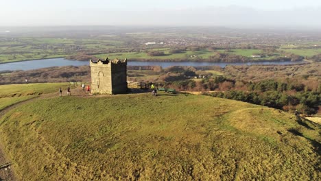 Landmark-Rivington-tower-Lancashire-reservoir-autumn-countryside-aerial-rising-view