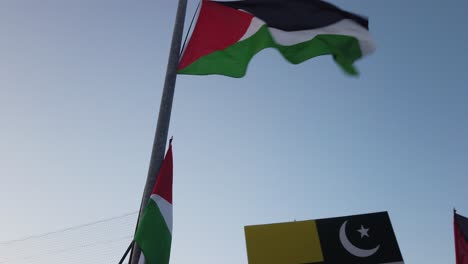 Two-Palestine-flags-flying-from-a-pole-outside-Hampden-Park