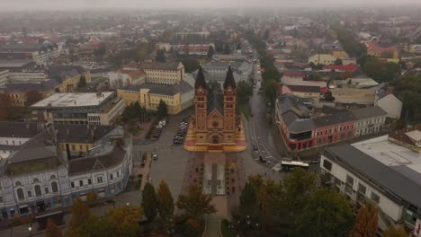 Drone-footage-from-a-Church-in-autumn-rainy-weather-Nyiregyhaza,-Hungary-Drone-moves-slowly