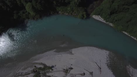 4K-Drone-footage-of-teal-blue-river-top-down