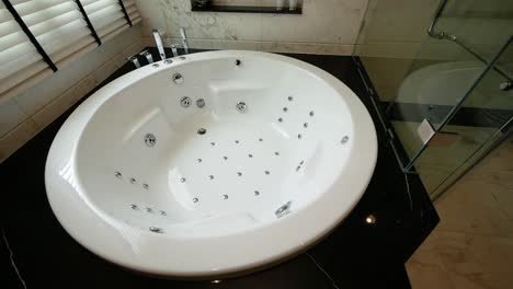 Close-Up-Footage-of-Luxury-Bathroom-With-Big-Jacuzzi