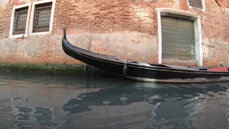 Taking-a-gondola-ride-in-Venice,-Italy-is-a-must-when-you-visit-this-city