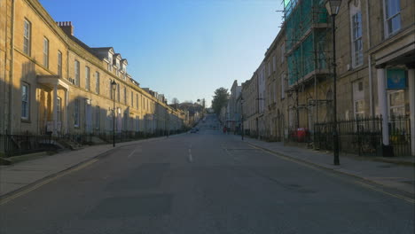 Eerily-empty-street-during-COVID-19-lockdown-in-UK,-wide-shot