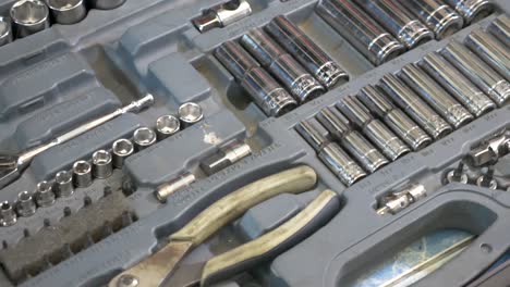 Close-up-Footage-of-Automotive-Tools-Box-With-Full-of-Different-Sizes-of-Bolts-and-Wrench